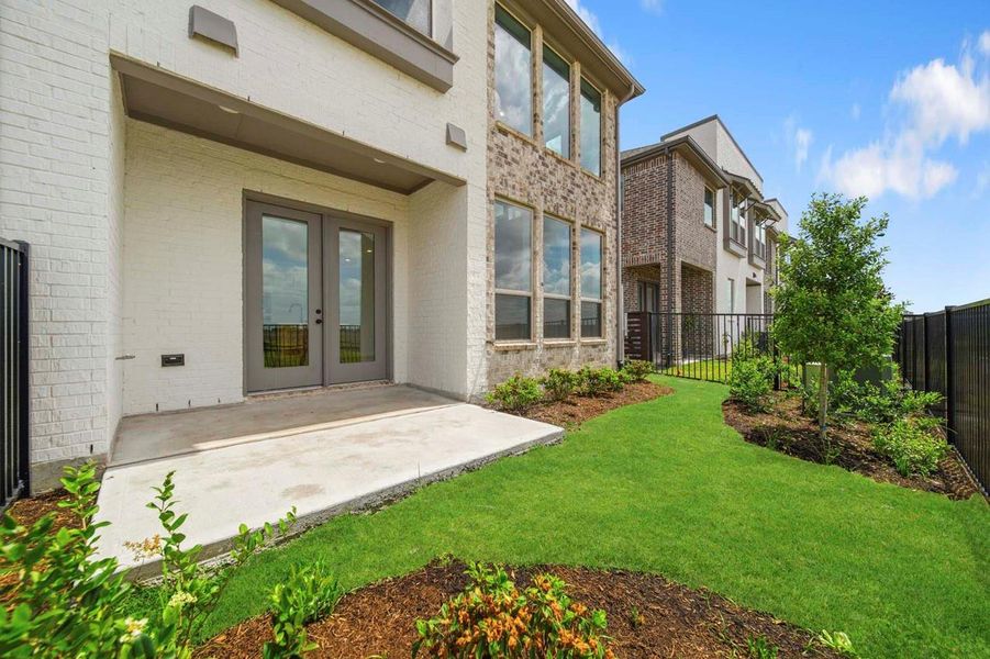 Exterior details and patio area of a home in Bridgeland, Cypress (Image 3).