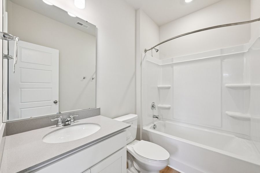 Representative furnished interior of a home built from the Gaston by Brookline Homes in The Crossing at Cramerton Mills, Gastonia (Image 5).