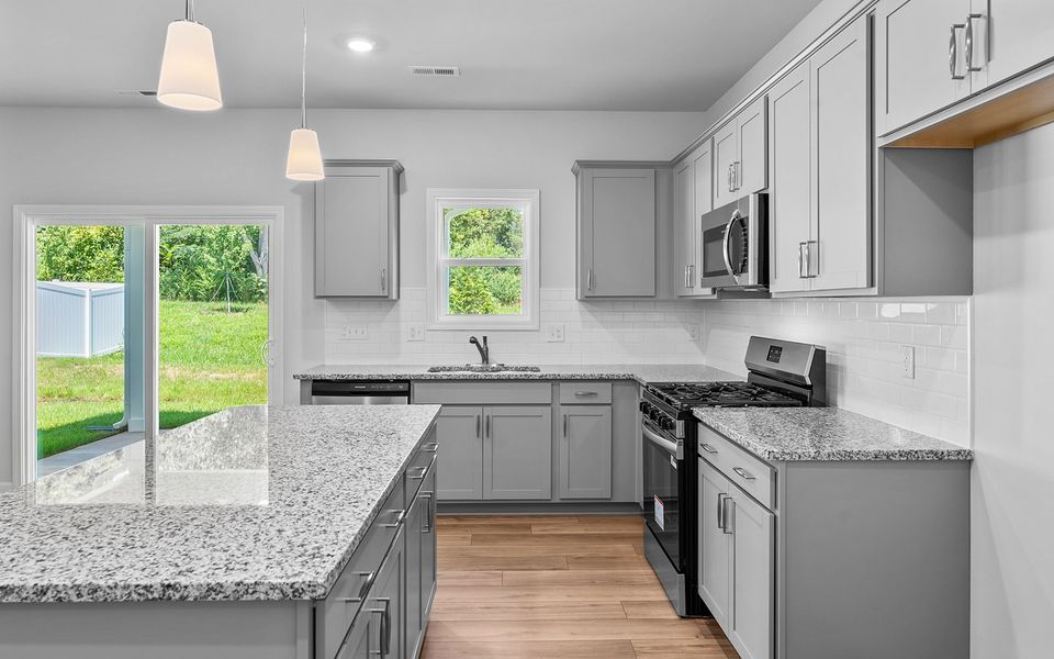 Furnished interior view inside a new home in Hanes Lake, Winston-Salem (Image 15). Furnished interior view inside a new home in Hanes Lake, Winston-Salem (Image 15).