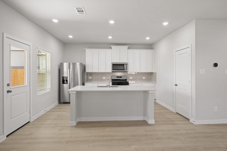 Furnished interior view inside a new home in Lakes at Black Oak, Magnolia (Image 8).