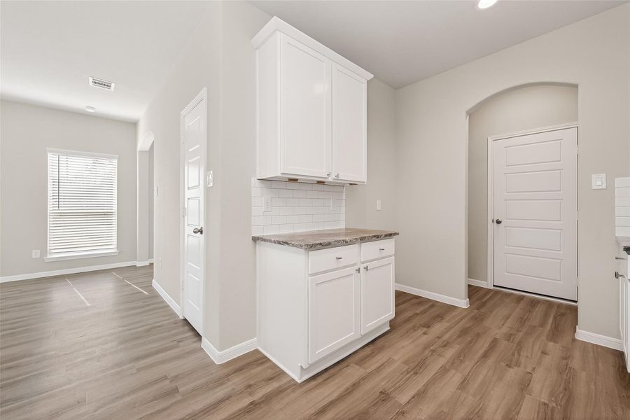 Furnished interior view inside a new home in Woodland Lakes, Houston (Image 4).