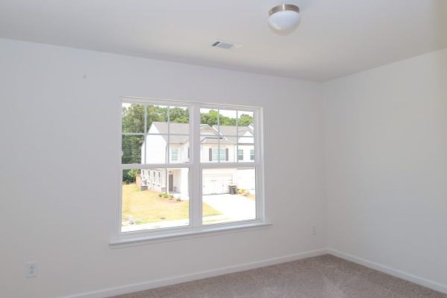 Representative unfurnished interior of a home built from the Emory Townhome by Piedmont Residential in The Retreat at Browns Ridge, Newnan (Image 41).
