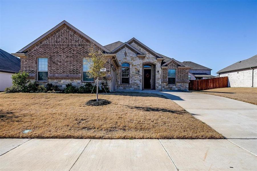 View of front of property featuring a front lawn