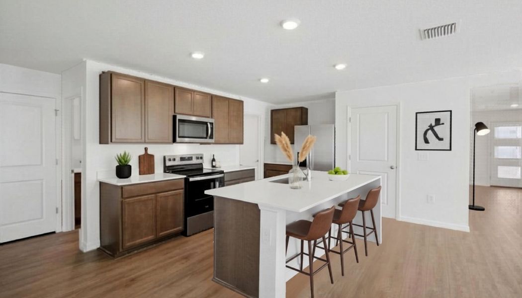 Representative furnished interior of a home built from the Robie Modern by D.R. Horton in Berry Bay, Wimauma (Image 4).