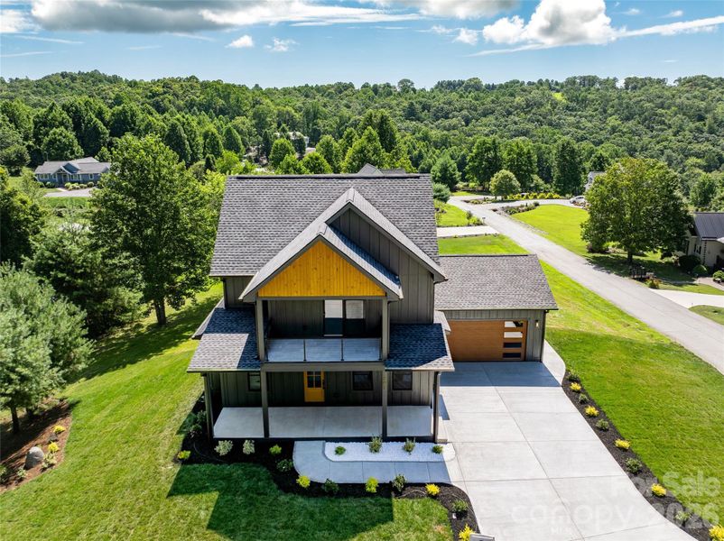 Front exterior of a new home in , Hendersonville, NC, highlighting curb appeal (Image 21). Front exterior of a new home in , Hendersonville, NC, highlighting curb appeal (Image 21).