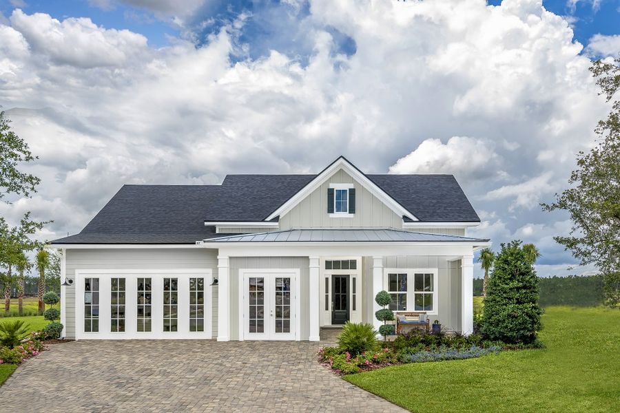 Representative exterior photo of a completed home built from the Ortega by Riverside Homes in Hidden Creek at SilverLeaf, St. Augustine, FL (Image 27). Representative exterior photo of a completed home built from the Ortega by Riverside Homes in Hidden Creek at SilverLeaf, St. Augustine, FL (Image 27).