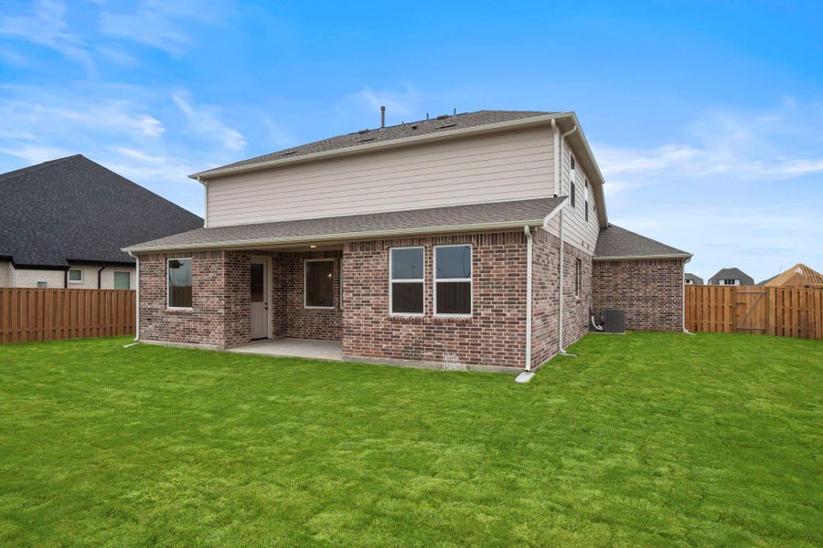 This backyard is perfect for family gatherings, social events, or simply unwinding in the fresh air.