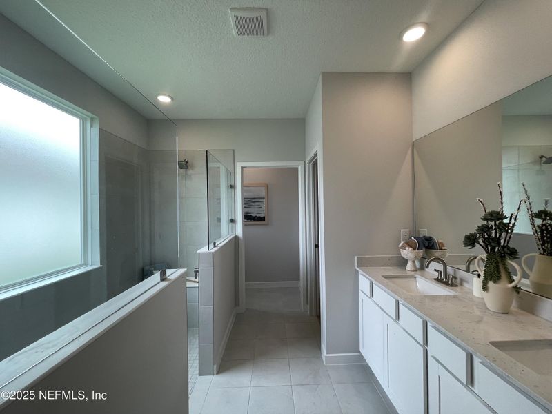 Furnished interior view inside a new home in The Magnolia Series at Reserve East, Flagler Beach (Image 16). Furnished interior view inside a new home in The Magnolia Series at Reserve East, Flagler Beach (Image 16).