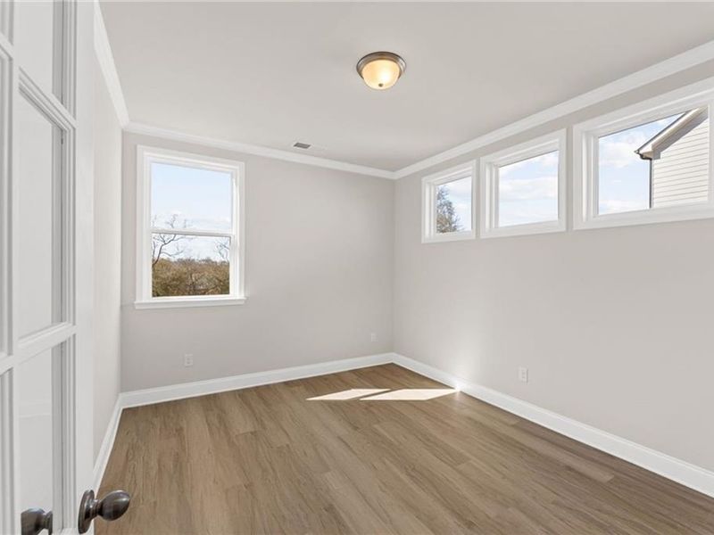 Spacious, unfurnished interior of a new home in Wehunt Meadows, Hoschton (Image 19).