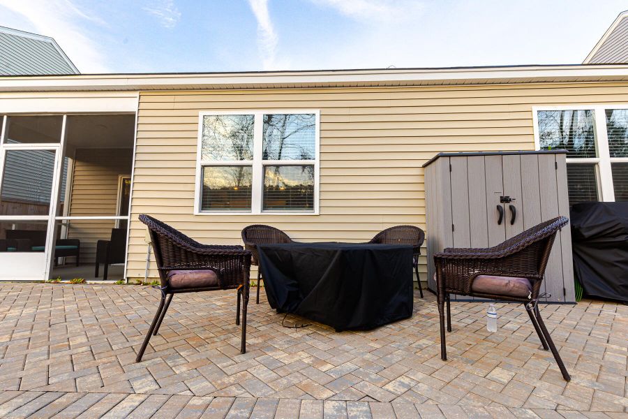 Exterior details and patio area of a home in Reserve at Mallard Crossing, Summerville (Image 29).