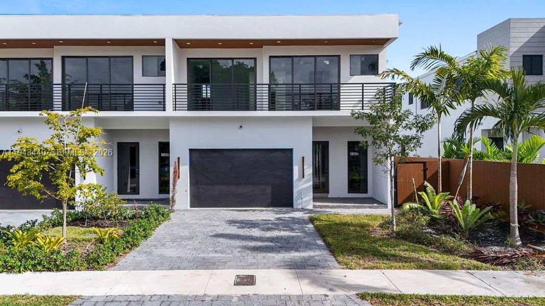 Front exterior of a new home in , Fort Lauderdale, FL, highlighting curb appeal (Image 28). Front exterior of a new home in , Fort Lauderdale, FL, highlighting curb appeal (Image 28).