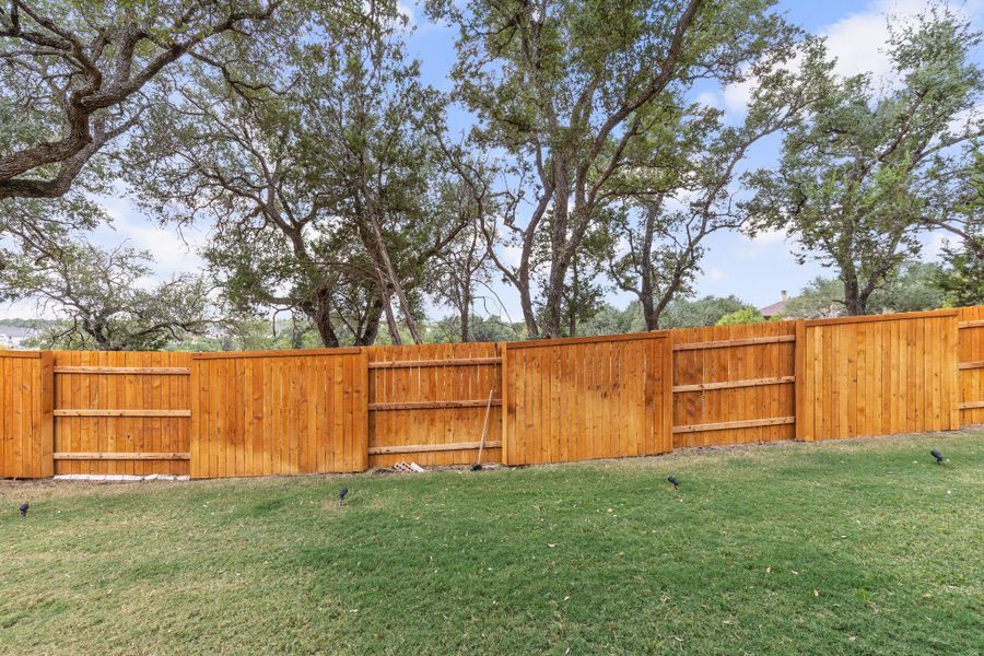 View of yard featuring a gate