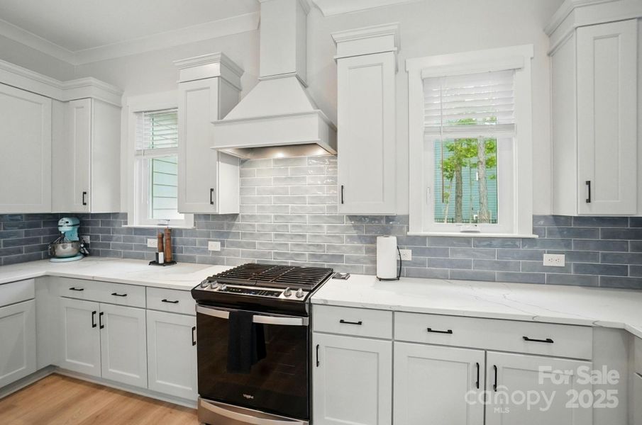 Gas range with hood Gas range with hood