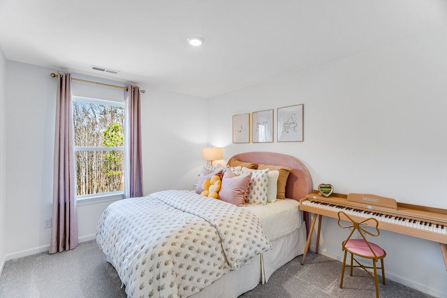 Representative furnished interior of a home built from the Cobblestone by Taylor Morrison in Silverstone Townes, Knightdale (Image 10).