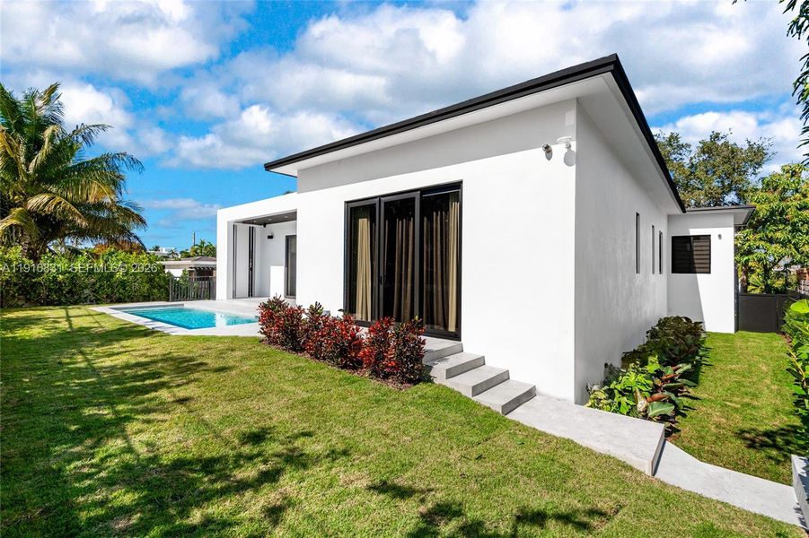 Exterior details and patio area of a home in , Miami Beach (Image 28).