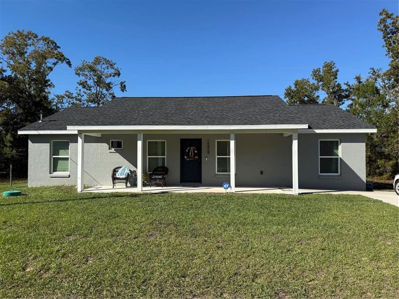 Exterior details and patio area of a home in , Ocklawaha (Image 2).