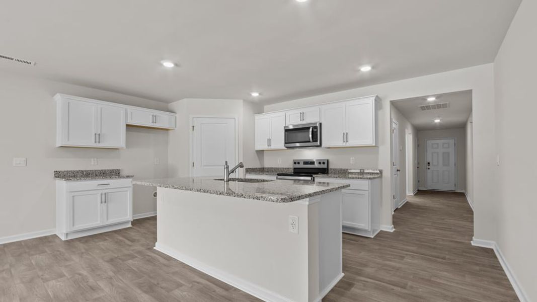 Furnished interior view inside a new home in Blair Ridge, La Grange (Image 7).