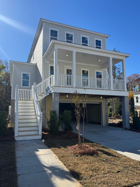 Front exterior of a new home in Indigo Grove Single Family Homes, Johns Island, SC, highlighting curb appeal (Image 2).