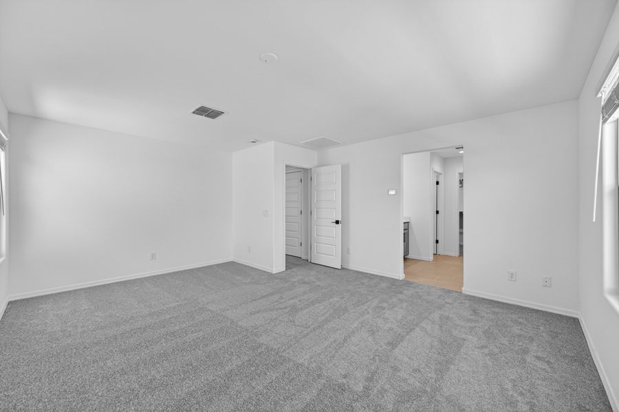 Spacious, unfurnished interior of a new home in Artisan at Asante, Surprise (Image 21).
