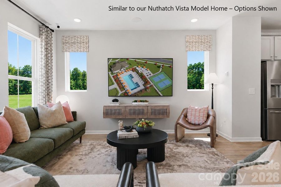 Spacious Living Room with an Abundance of Natural Light Spacious Living Room with an Abundance of Natural Light