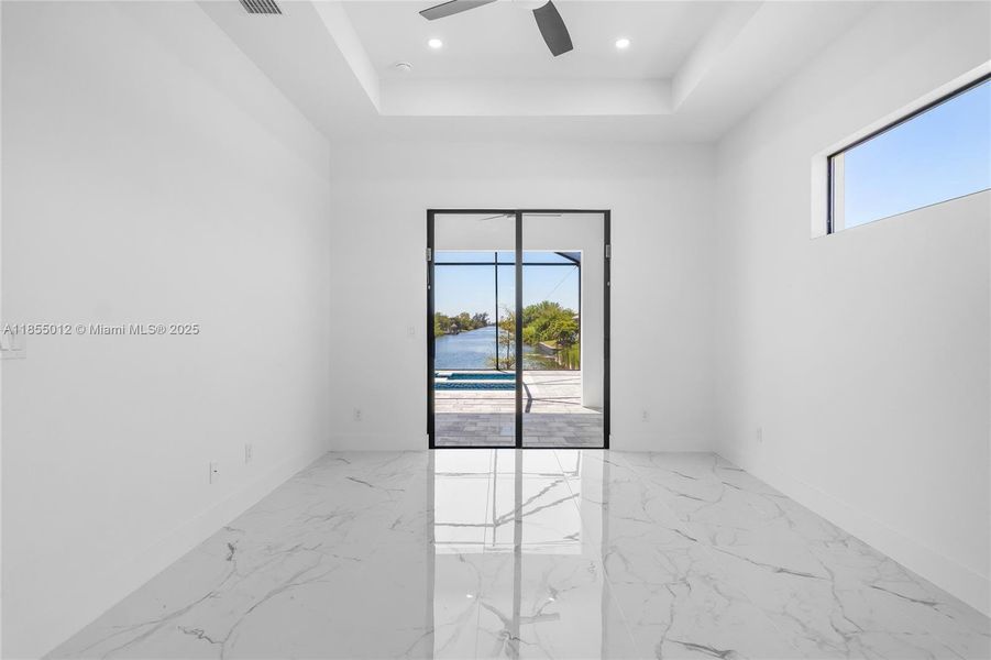 Primary Bedroom Overlooks the Water