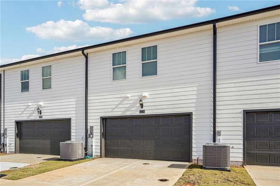 Front exterior of a new home in , Conyers, GA, highlighting curb appeal (Image 21).