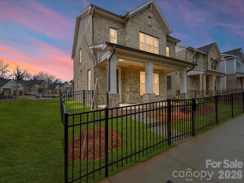 Exterior details and patio area of a home in Whitley Preserve – Park Collection, Mint Hill (Image 19).