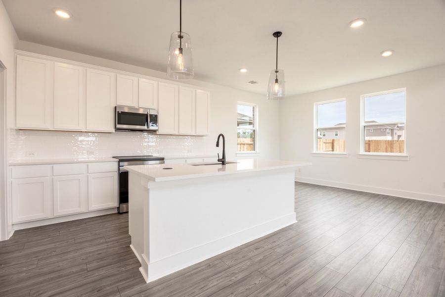 Furnished interior view inside a new home in Sage Collection – Freedom at Anthem, Kyle (Image 7).