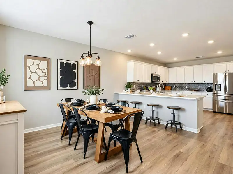 Dine at the bar, or in the sunny eat-in cafe - Wayfair III by Highland Homes