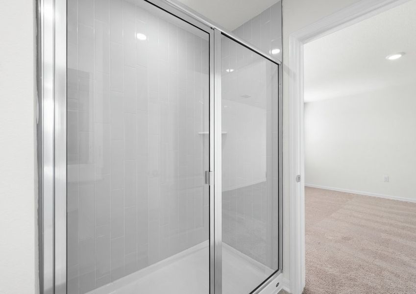 The master bathroom features this walk-in shower