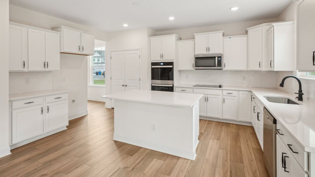 Furnished interior view inside a new home in Whispering Pines, Franklinton (Image 14).