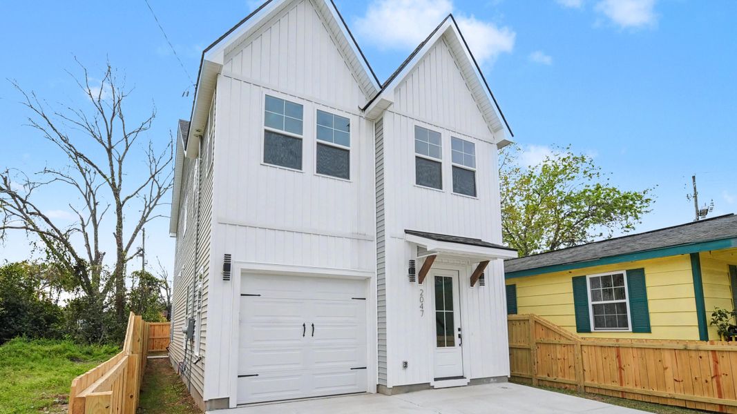 Front exterior of a new home in , North Charleston, SC, highlighting curb appeal (Image 2). Front exterior of a new home in , North Charleston, SC, highlighting curb appeal (Image 2).