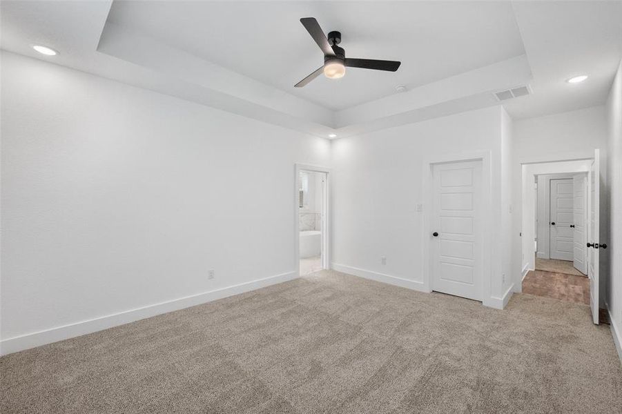 Primary bedroom with ensuite bathroom Primary bedroom with ensuite bathroom