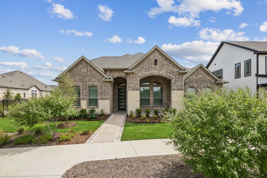 Representative exterior photo of a completed home built from the Normandy by Chesmar Homes in Karis, Crowley, TX (Image 7). Representative exterior photo of a completed home built from the Normandy by Chesmar Homes in Karis, Crowley, TX (Image 7).