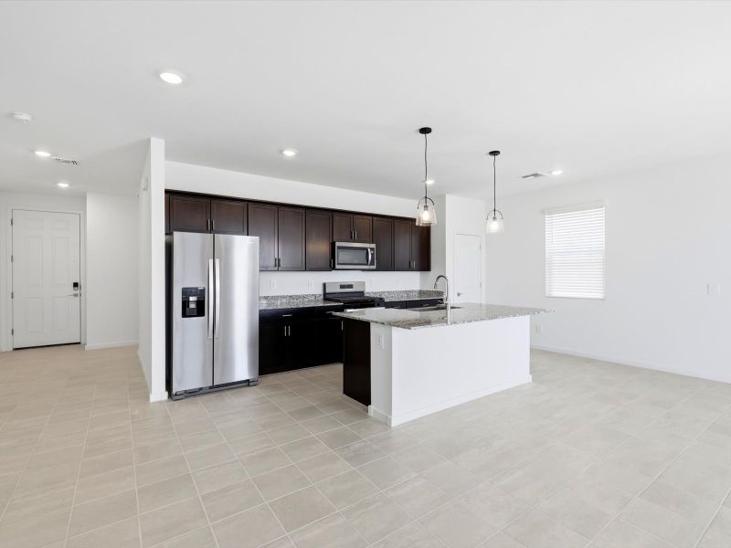 Furnished interior view inside a new home in Silva Farms - Classic Series, Goodyear (Image 2).