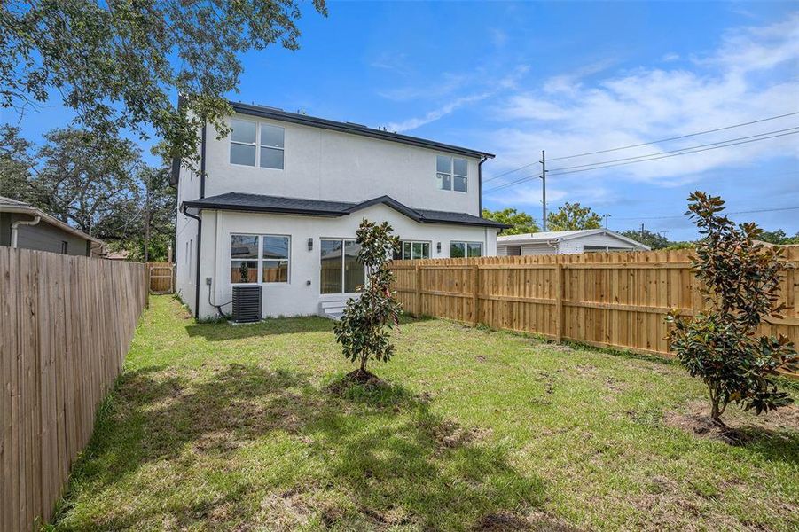 Front exterior of a new home in , Tampa, FL, highlighting curb appeal (Image 23).