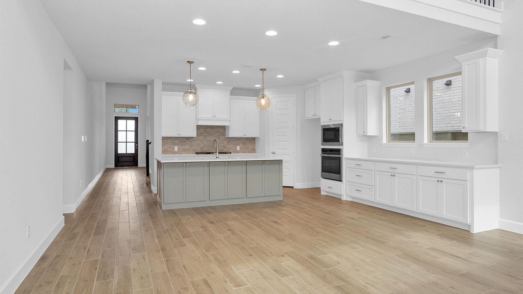 Furnished interior view inside a new home in Legacy, League City (Image 6).