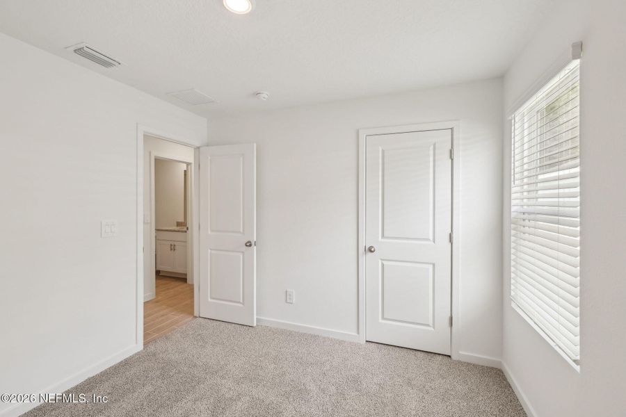 Spacious, unfurnished interior of a new home in Flagler Village - Classic Series, Palm Coast (Image 18). Spacious, unfurnished interior of a new home in Flagler Village - Classic Series, Palm Coast (Image 18).