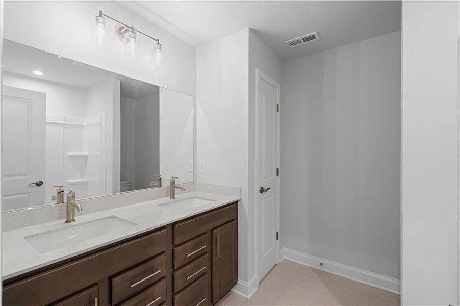 Furnished interior view inside a new home in Reunion, Flowery Branch (Image 7).