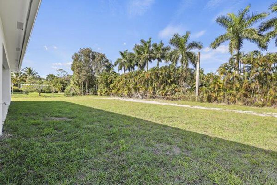 Exterior details and patio area of a home in , Loxahatchee (Image 3).
