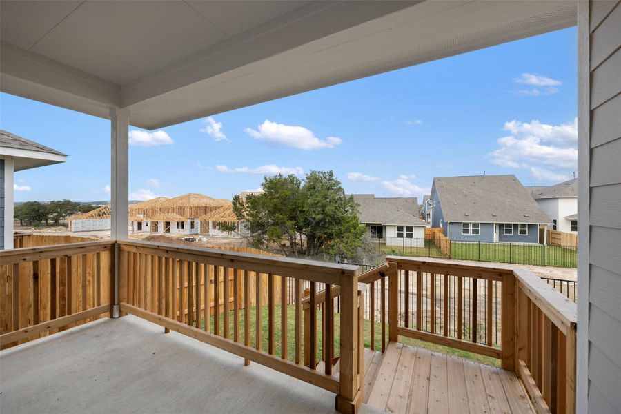 Exterior details and patio area of a home in Cannon Ranch 40s, Dripping Springs (Image 11).
