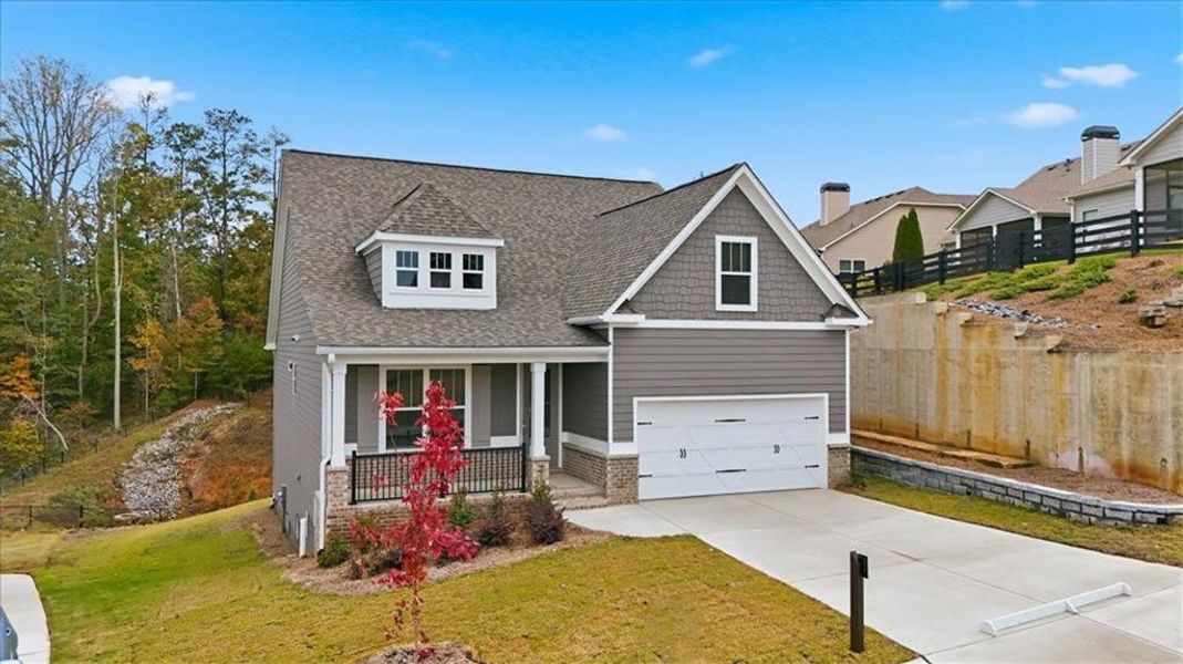 Front exterior of a new home in , Dallas, GA, highlighting curb appeal (Image 22).