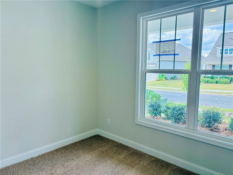 Spacious, unfurnished interior of a new home in Heritage Pointe at The Georgian, Villa Rica (Image 11).