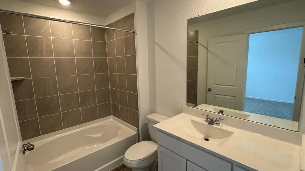 Furnished interior view inside a new home in The Villas at Legacy Park, Houston (Image 5).