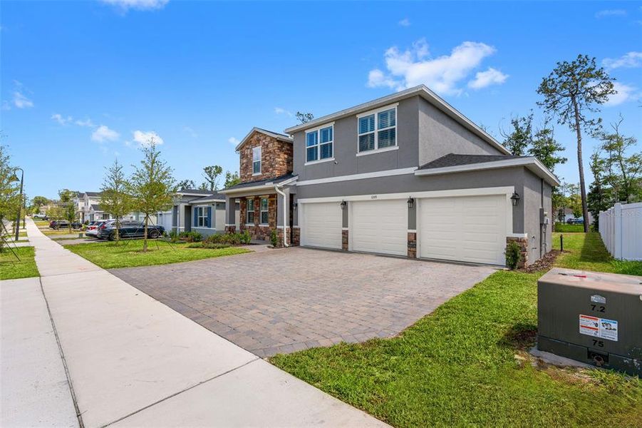 Front exterior of a new home in , Deland, FL, highlighting curb appeal (Image 28).