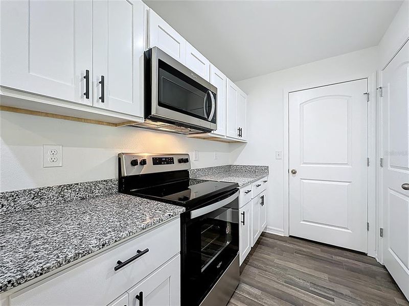 Furnished interior view inside a new home in , Crescent City (Image 10).