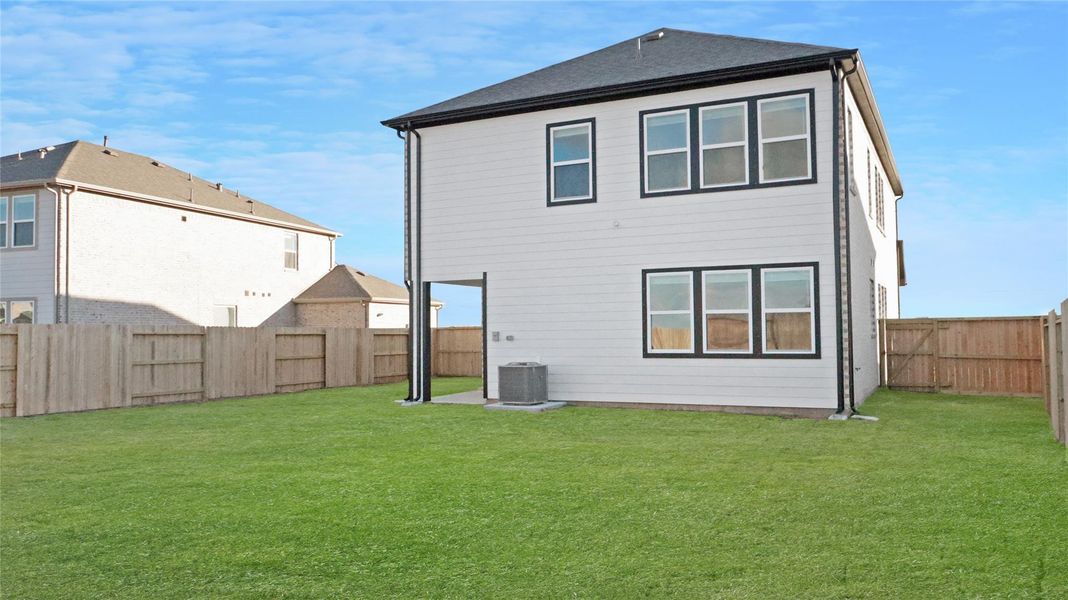 Exterior details and patio area of a home in Creekhaven, Arcola (Image 3).