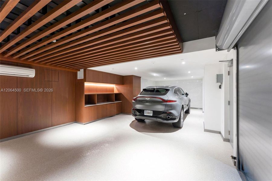Private air-conditioned garage accommodating 2 cars, plus 3 additional side-by-side parking spaces included with the unit. Private air-conditioned garage accommodating 2 cars, plus 3 additional side-by-side parking spaces included with the unit.