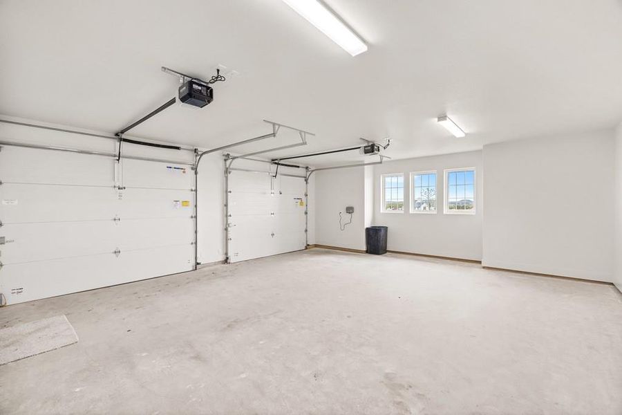 Two car garage with a garage door opener Two car garage with a garage door opener