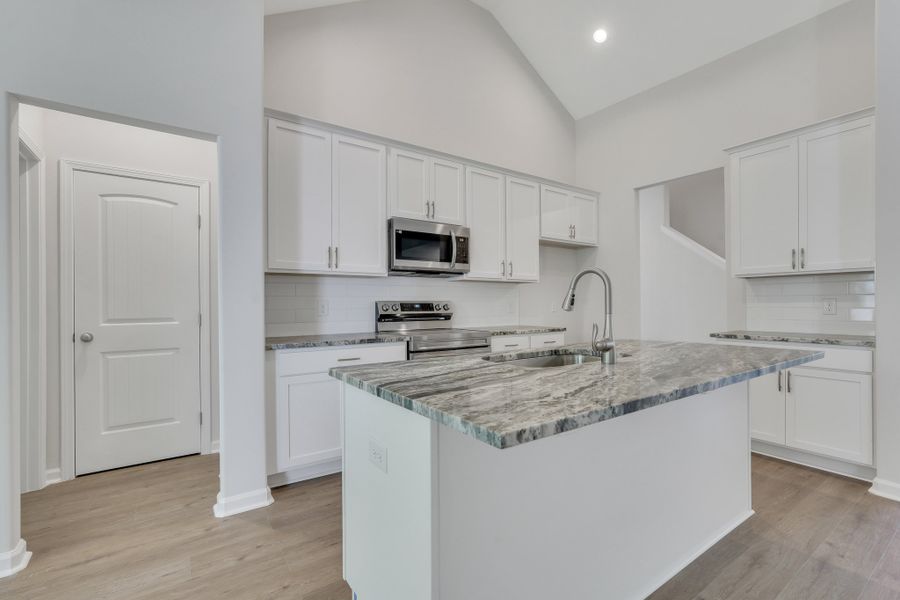 Representative furnished interior of a home built from the The Camilla + Bonus Room by Smith Family Homes in Ramsey Landing, Rincon (Image 4).